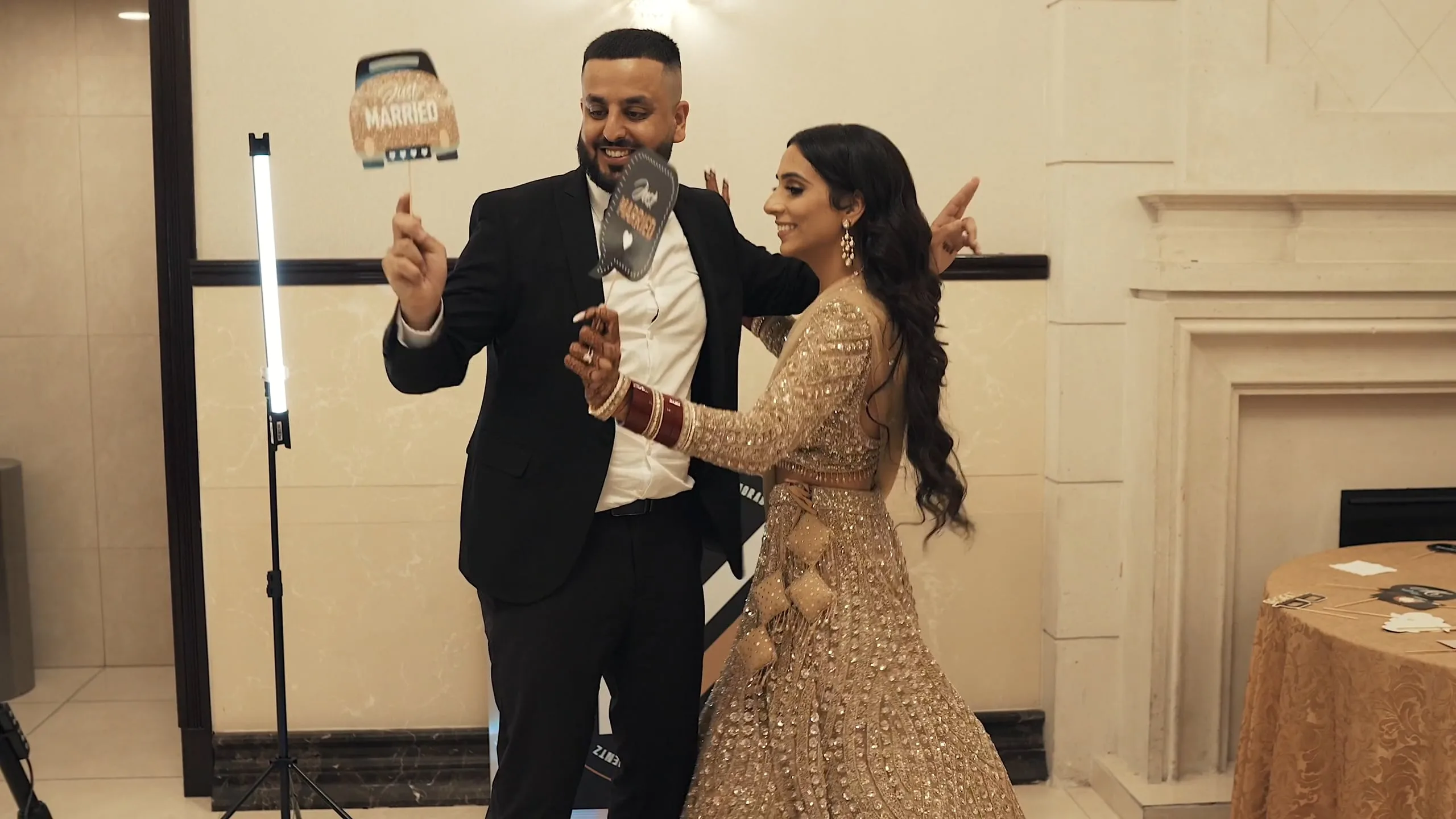 Sikh bride and groom at their wedding reception at Woodbine Banquet Hall in Etobicoke with professional photo and video coverage