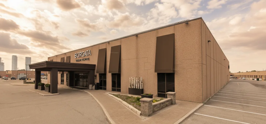 Grand wedding reception at Borgata Event Centre by Avani with white marble floors and elegant chandeliers.
