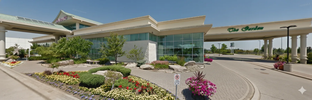 Front entrance of The Garden Banquet & Convention Centre Brampton featuring a grand lobby.